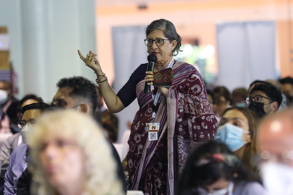 Participants ask questions during the Second Stakeholder Forum.