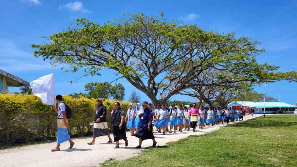 group of people walking outdoors