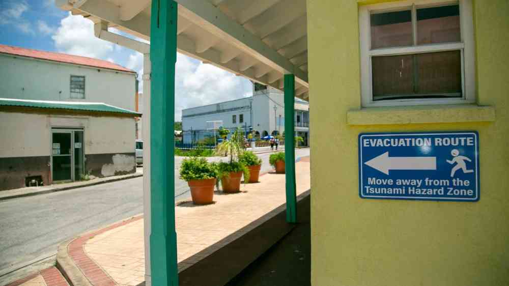 village houses showing a evacuation sign