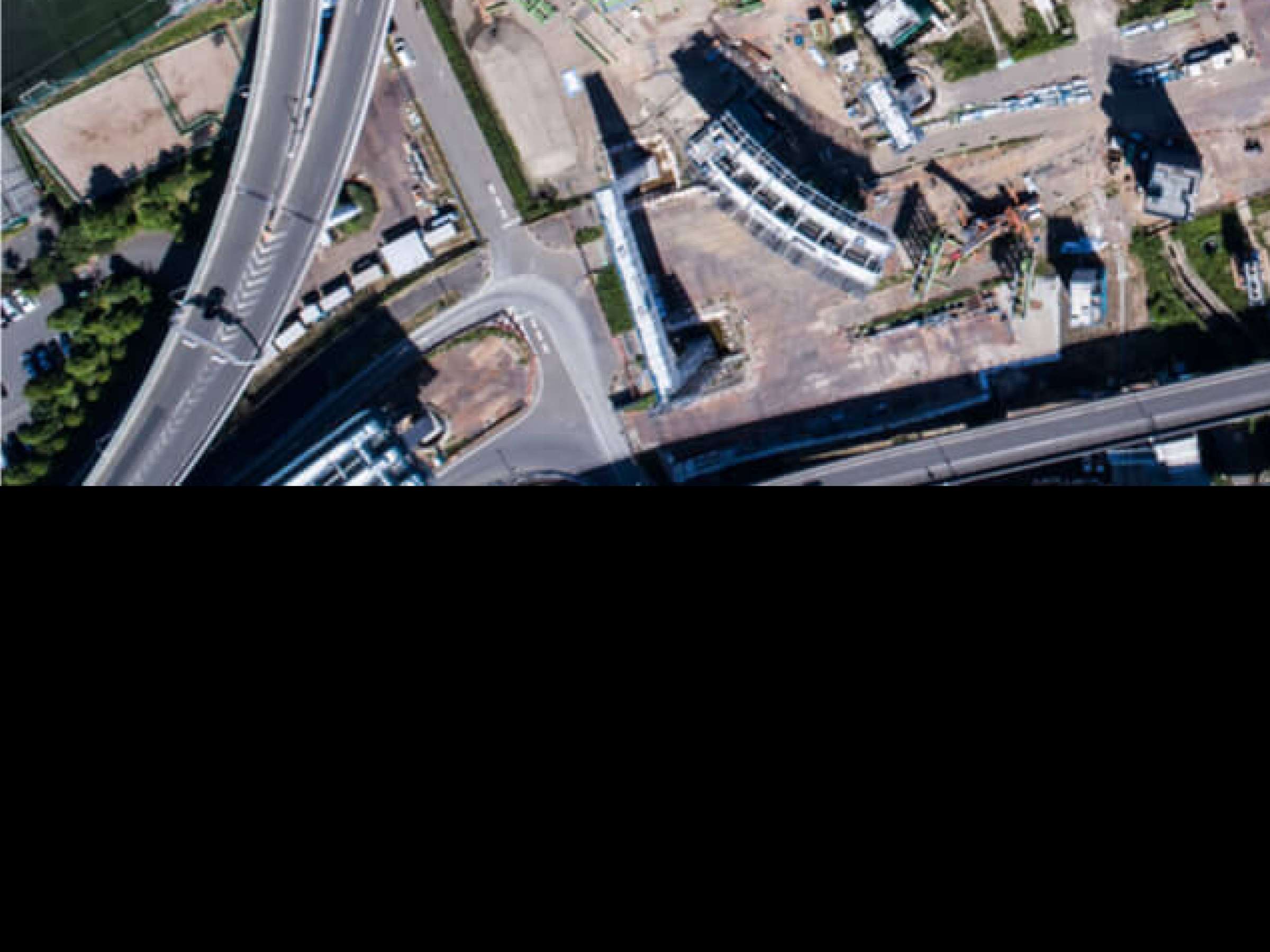 Aerial photograph of effect road under construction.