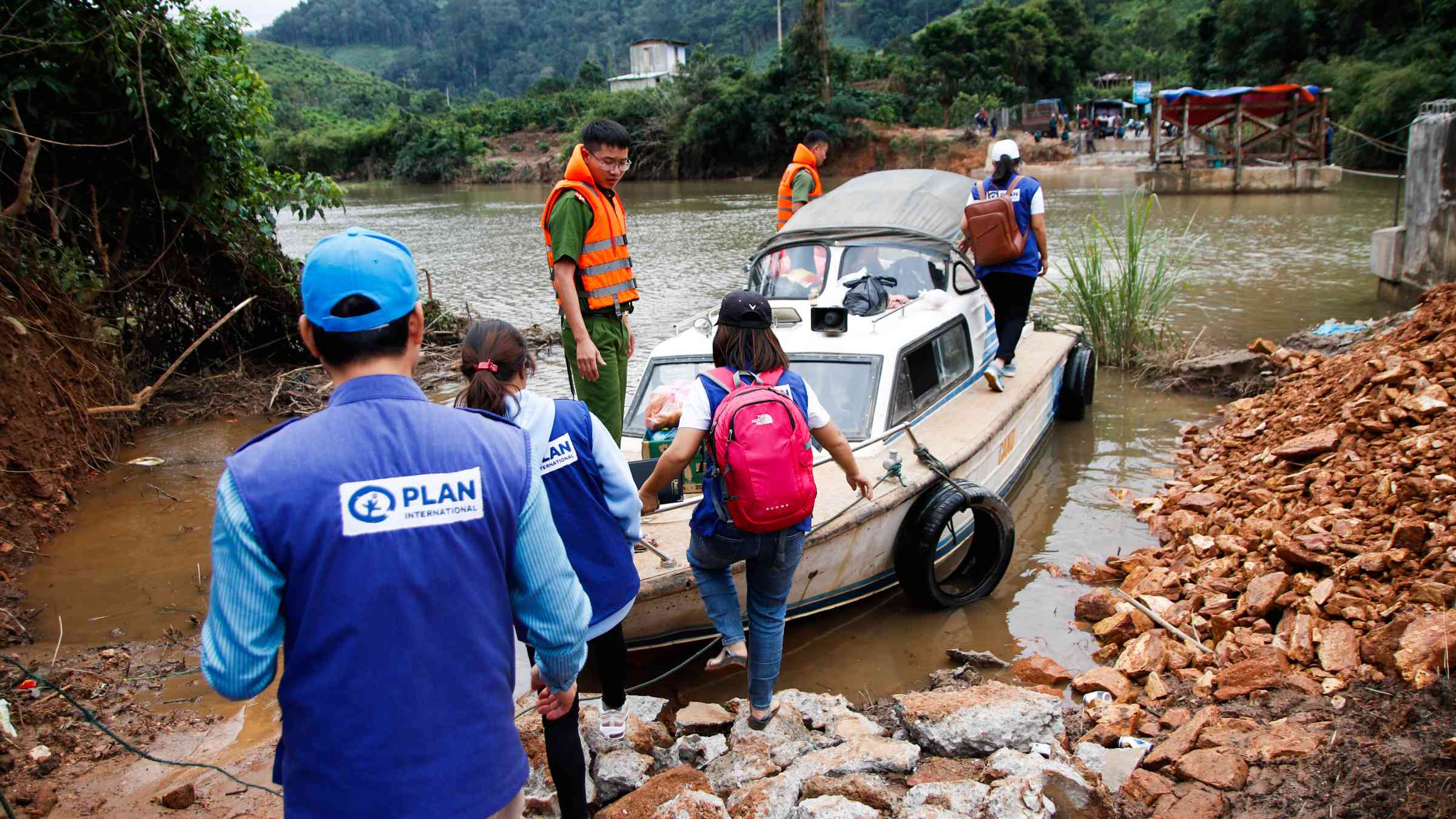 Boats transport relief aid to communities cut off by the typhoon-min.