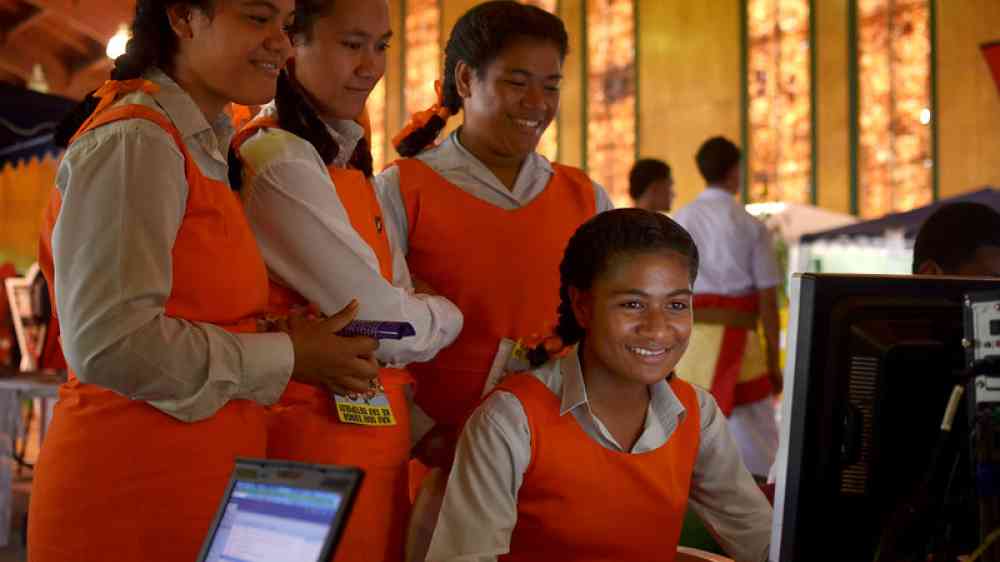 Students from Tonga's Tailulu College making the most of new high-speed broadband services